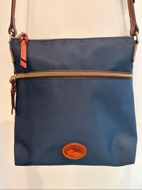 Dooney & Bourke Navy Crossbody with Brown Leather Accents. New without tags
